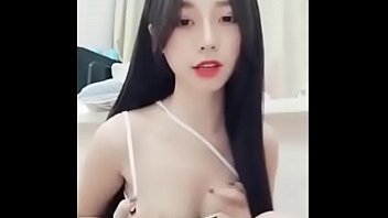 Asian Beauty On Phone Call